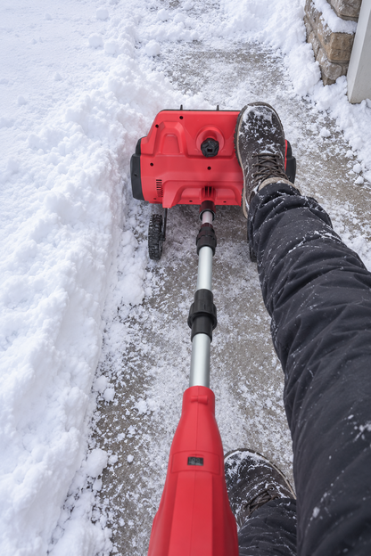 Närbild på snöskovelns snöintag